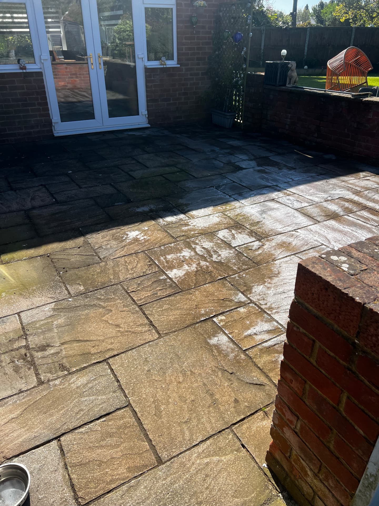Patio half cleaned