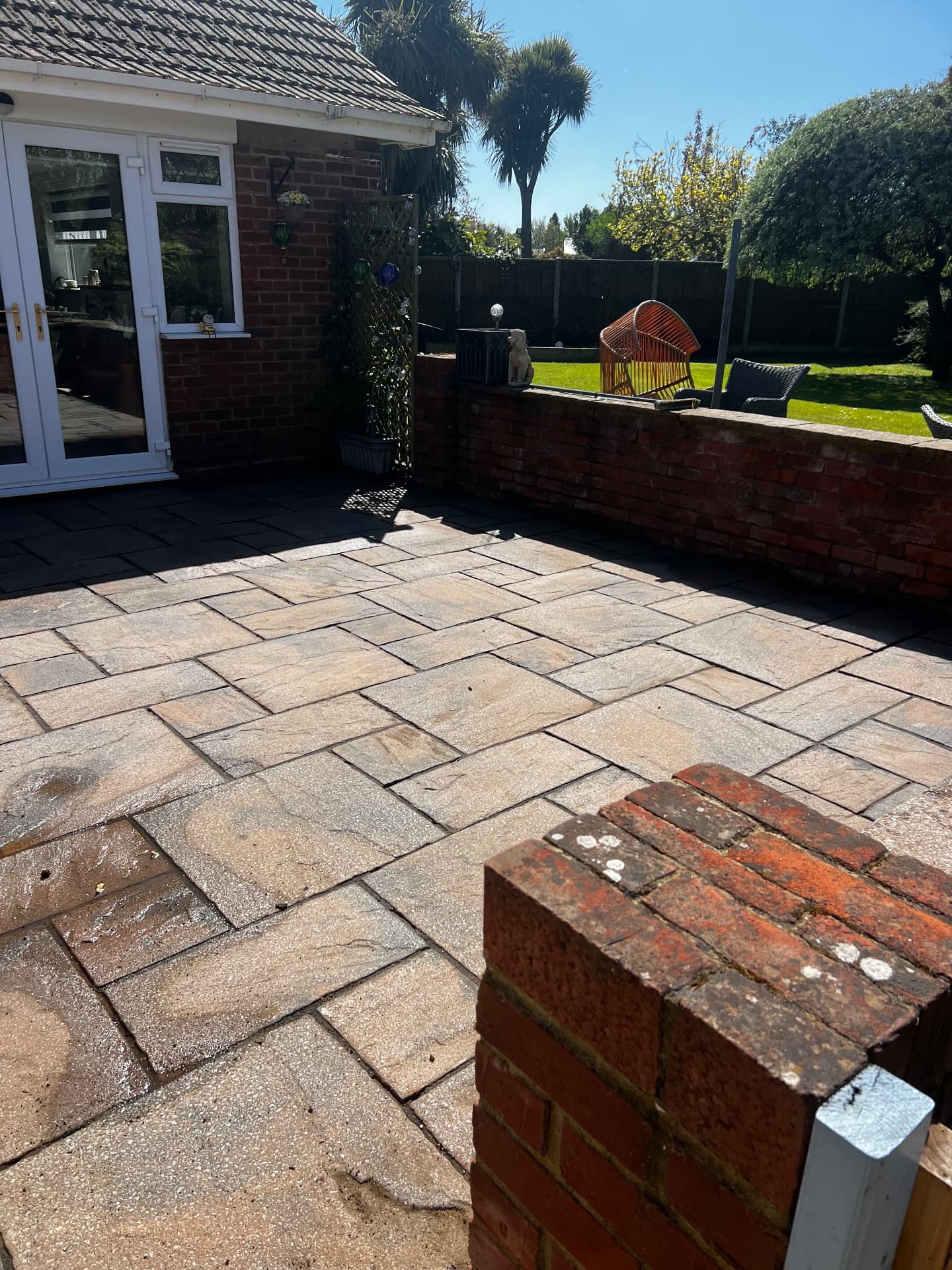 Freshly jet washed sandstone patio
